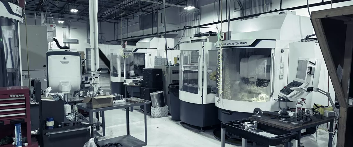 A small manufacturer's workshop floor with CNC machines